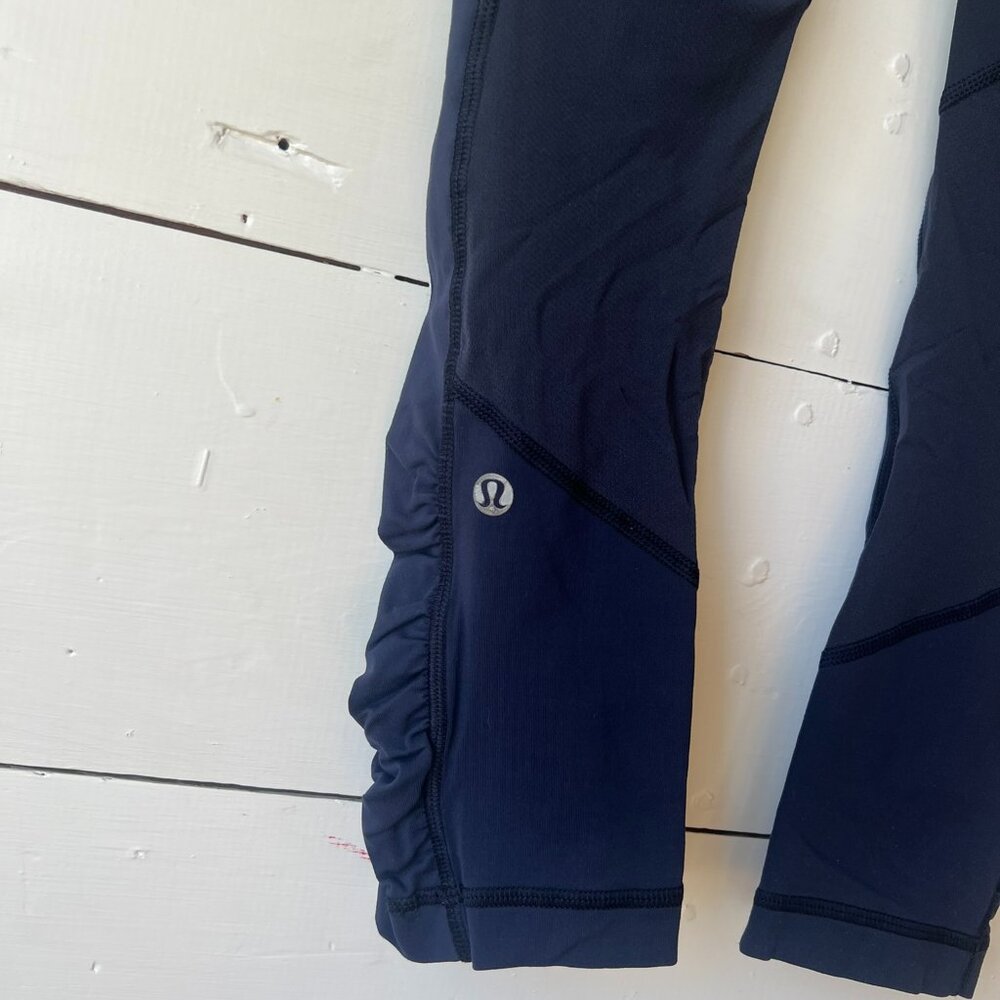 Navy Lululemon tights in size 4